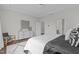 This bedroom features a spacious bed with a dresser, modern decor, and ample natural light, creating a relaxing space at 520 Flip Trl, Cary, NC 27513
