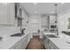Spacious kitchen features custom cabinets, modern appliances, and a functional layout for culinary enthusiasts at 520 Flip Trl, Cary, NC 27513