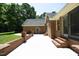 Brick patio with ample space for entertaining at 5464 Bass Mountain Rd, Snow Camp, NC 27349
