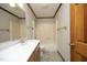 Bathroom with a vanity and shower-tub combination at 5464 Bass Mountain Rd, Snow Camp, NC 27349