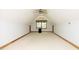 Large bonus room with neutral carpet, ceiling fan, and natural light at 5464 Bass Mountain Rd, Snow Camp, NC 27349