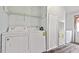 Convenient laundry area with a washer, dryer, and storage space at 558 Christys Way, Roxboro, NC 27574