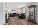 Bright living room with a fireplace, hardwood floors, and comfortable seating at 558 Christys Way, Roxboro, NC 27574