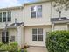 Charming backyard with a patio, white siding, and lush greenery, perfect for relaxation at 5717 Corbon Crest Ln, Raleigh, NC 27612