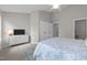 Calm bedroom with vaulted ceiling, white dresser and relaxing decor at 5717 Corbon Crest Ln, Raleigh, NC 27612