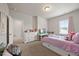 Charming bedroom with a comfy bed, a white dresser, and a cozy atmosphere at 601 Richlands Cliff Dr, Youngsville, NC 27596