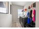 Bright laundry area featuring modern appliances and convenient storage options at 601 Richlands Cliff Dr, Youngsville, NC 27596