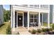 Inviting front porch with a welcoming entrance, perfect for enjoying quiet moments and adding curb appeal at 627 Georgias Landing Pkwy, Raleigh, NC 27603