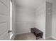 A carpeted walk-in closet with wooden storage at 627 Georgias Landing Pkwy, Raleigh, NC 27603