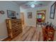 Open-concept entryway with hardwood floors and access to multiple rooms at 6305 Holly Ridge Rd, Rougemont, NC 27572