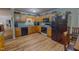 Traditional kitchen with wood cabinets, modern appliances, and plenty of countertop space at 6305 Holly Ridge Rd, Rougemont, NC 27572