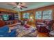 Inviting living room features built in shelving and comfortable seating at 6305 Holly Ridge Rd, Rougemont, NC 27572