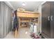 Cozy bedroom features a unique loft bed over a storage area, perfect for maximizing space at 656 Atkins Rd, Fuquay Varina, NC 27526
