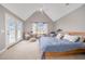 Spacious main bedroom with a vaulted ceiling, lots of natural light, and neutral decor at 656 Atkins Rd, Fuquay Varina, NC 27526