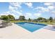 Enjoy sunny days by the private in-ground pool with lounge chairs and a well-manicured fenced yard at 656 Atkins Rd, Fuquay Varina, NC 27526