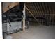 View of the attic with exposed rafters, ductwork and unfinished floor at 70 Basil Ct, Franklinton, NC 27525