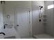 Bathroom showcasing a glass-enclosed shower with tile surround and modern fixtures at 70 Basil Ct, Franklinton, NC 27525