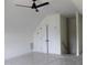 Bonus room offering extra space with ceiling fan, closet, and clean lines at 70 Basil Ct, Franklinton, NC 27525