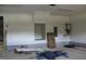 Bright garage space with a water heater and potential for storage or parking at 70 Basil Ct, Franklinton, NC 27525