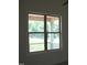 The window offers picturesque views of the outdoors and a welcoming porch at 70 Basil Ct, Franklinton, NC 27525