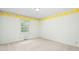 Empty bedroom with carpet, window, and flower-patterned trim at 712 Orange High School Rd, Hillsborough, NC 27278