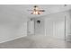 Bedroom featuring plush carpet, a ceiling fan, and closet space at 760 Stackhurst Way, Wake Forest, NC 27587
