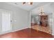 Cozy dining area adjacent to the kitchen, featuring hardwood floors and ample natural light at 760 Stackhurst Way, Wake Forest, NC 27587