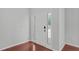 Inviting entryway with hardwood floors and decorative sidelights, welcoming you into the home at 760 Stackhurst Way, Wake Forest, NC 27587