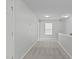 Hallway features plush carpeting at 760 Stackhurst Way, Wake Forest, NC 27587