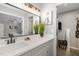 Bright bathroom featuring a long vanity, and a view of the bedroom and walk-in closet at 7708 Falcon Rest Cir, Raleigh, NC 27615