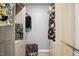 Walk-in closet with wood organizers and hanging storage space at 7708 Falcon Rest Cir, Raleigh, NC 27615