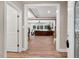 Spacious entryway showcasing an open-concept layout with hardwood floors leading to a bright living area at 8226 Mcarthur Park Dr, Efland, NC 27243