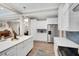 Stylish kitchen with stainless steel refrigerator and ample countertop space at 8226 Mcarthur Park Dr, Efland, NC 27243