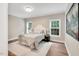 Cozy main bedroom featuring a decorative headboard, soft textures, and natural light at 8226 Mcarthur Park Dr, Efland, NC 27243