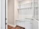 Well-organized mudroom with a bench, hooks, and storage cabinets for convenient organization at 8226 Mcarthur Park Dr, Efland, NC 27243