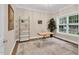 Bright office with hardwood floors, modern desk, and natural light at 8226 Mcarthur Park Dr, Efland, NC 27243