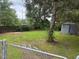Spacious backyard with a lawn and a shed at 921 Alabama Ave, Durham, NC 27705