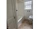 Clean bathroom featuring a tiled shower and vanity at 921 Alabama Ave, Durham, NC 27705