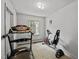 Exercise room featuring a treadmill, bike, and other exercise equipment at 101 Goldston Dr, Carrboro, NC 27510