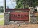 Attractive stone sign for the Trivium at Brier Creek community with lush landscaping at 1018 Excite Ave, Morrisville, NC 27560