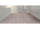 Open hallway featuring neutral walls, white trim, and plush carpeting at 1018 Excite Ave, Morrisville, NC 27560