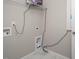 Functional laundry room featuring modern appliances and shelving at 1018 Excite Ave, Morrisville, NC 27560