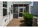 Cozy screened porch showcasing the outdoor living space with serene views at 1018 Excite Ave, Morrisville, NC 27560