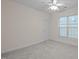 Bright bedroom with a ceiling fan and one window overlooking the yard at 1040 Bellenden Dr, Durham, NC 27713