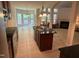 Gourmet kitchen with a center island, granite countertops, stainless steel appliances and arched entryways at 1040 Bellenden Dr, Durham, NC 27713