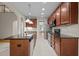 Well-equipped kitchen with granite countertops, stainless steel appliances, and ample cabinet space for storage at 1040 Bellenden Dr, Durham, NC 27713