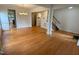 Bright and airy living room with hardwood floors, crown molding, and an open layout at 1040 Bellenden Dr, Durham, NC 27713