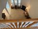 Overhead view of the living room featuring carpet, fireplace, and large windows providing ample natural light at 1040 Bellenden Dr, Durham, NC 27713
