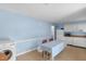 Kitchen with light blue walls and a washing machine at 106 Lattimore Ln, Durham, NC 27713