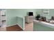 Inviting living space with wood floors, and view into the kitchen at 106 Lattimore Ln, Durham, NC 27713